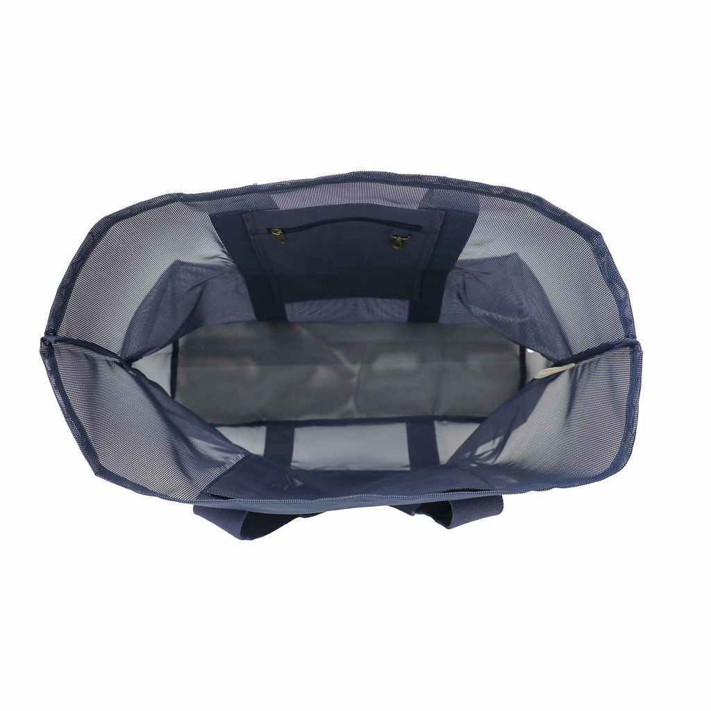 Oversized Sande Kids mesh beach bag in Deep Sea Navy, displayed in a studio setting. Shown from the top to reveal the spacious interior, featuring a secure canvas pocket for valuables, a handy key clip, and a large mesh pocket for extra storage. Set against a white background.