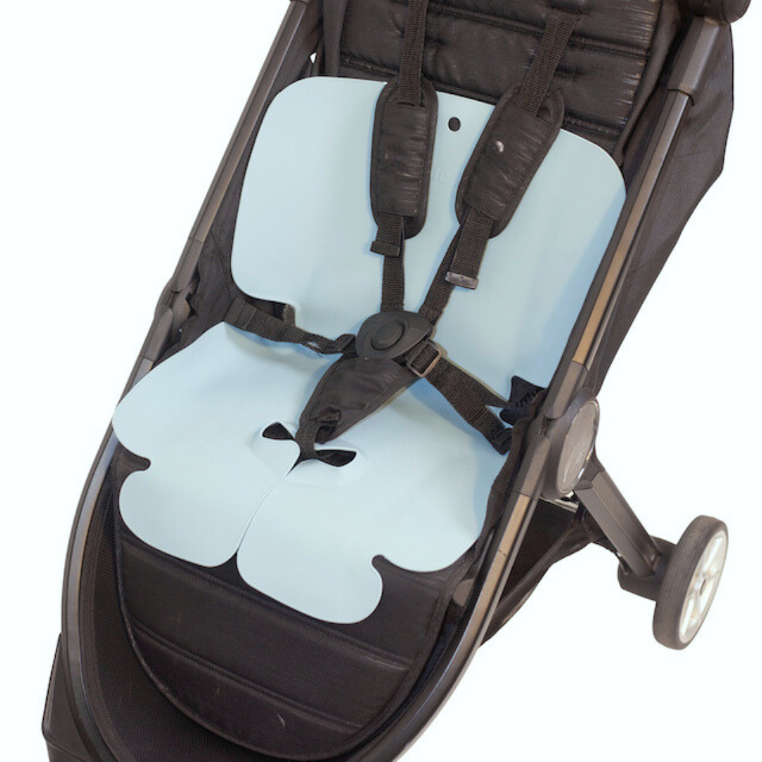 The Sande Kids™ waterproof car seat and pram liner in Ocean Blue is shown in a pram or stroller.