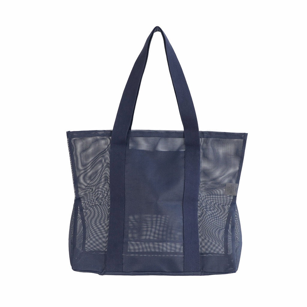 Sande Kids Beach Hauler - large mesh beach bag in Deep Sea Navy, displayed in a studio setting from the rear. This view highlights the breathable mesh design, thick cotton straps, and durable construction. Set against a white background.