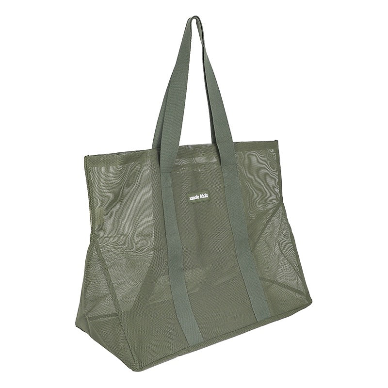 45-degree view product photo of the Sande Kids Beach Hauler oversized mesh beach bag in sage or olive green on a white background, highlighting its durable design and spacious interior.