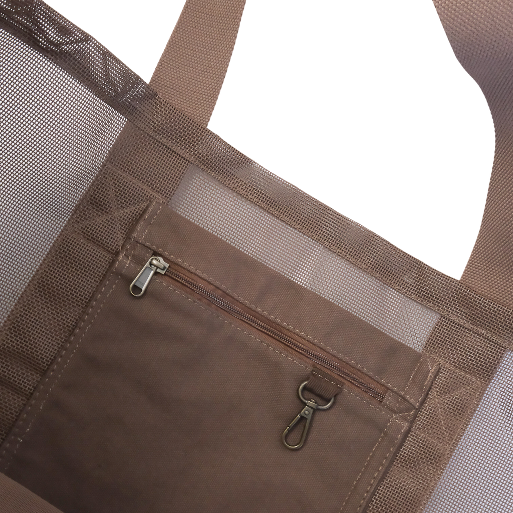 Close-up image of the Sande™ Beach Hauler oversized mesh bag carry-all in Espresso Brown, showing the durable mesh fabric and internal canvas pocket with key clip for valuables. Ideal for carrying beach essentials on beach days, market trips, and outdoor adventures.