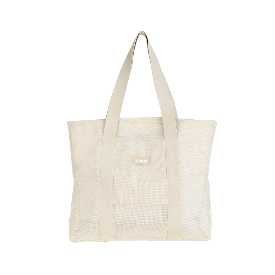 Front view of the Sande™ Beach Hauler -Mini mesh beach bag in Sand/Neutral against a white background, highlighting its spacious interior, durable mesh fabric, and family-friendly design, perfect for beach outings and outdoor activities.