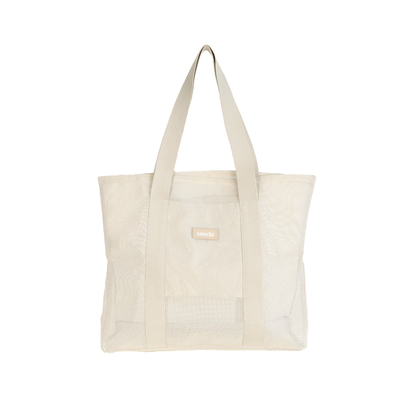 Front view of the Sande™ Beach Hauler -Mini mesh beach bag in Sand/Neutral against a white background, highlighting its spacious interior, durable mesh fabric, and family-friendly design, perfect for beach outings and outdoor activities.