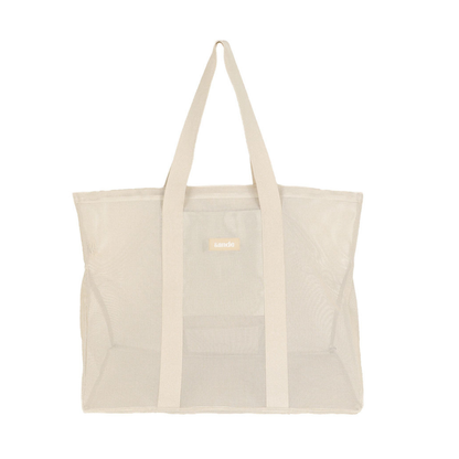 Front view of the original Sande Kids Beach Hauler - extra-large mesh beach bag in Sand (neutral), showcasing its spacious design, durable mesh fabric, and family-friendly features, perfect for beach trips and outdoor adventures.